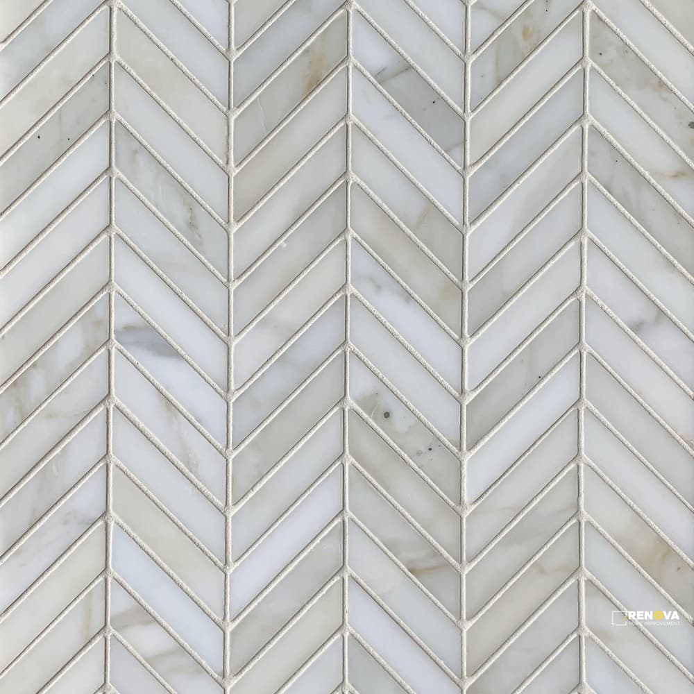 CALACATTA GOLD STONE ESSENTIALS HONED/POLISHED CHEVRON MOSAIC 5/8" X 2-1/2"